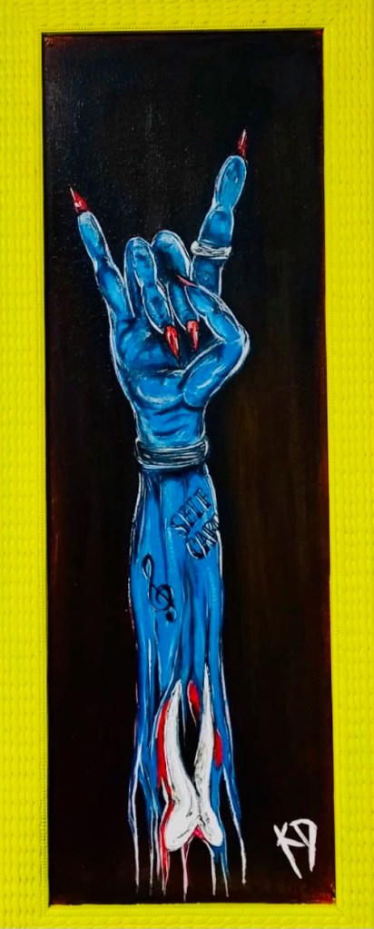 A disembodied arm with blue skin and a self-care tattoo flashes the sign of the horns