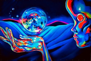 A blue humanoid with rainbow highlights holds a floating sphere in cupped hands.