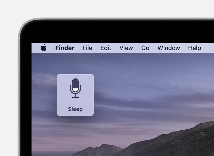 Screenshot of macOS desktop showing the voice control microphone