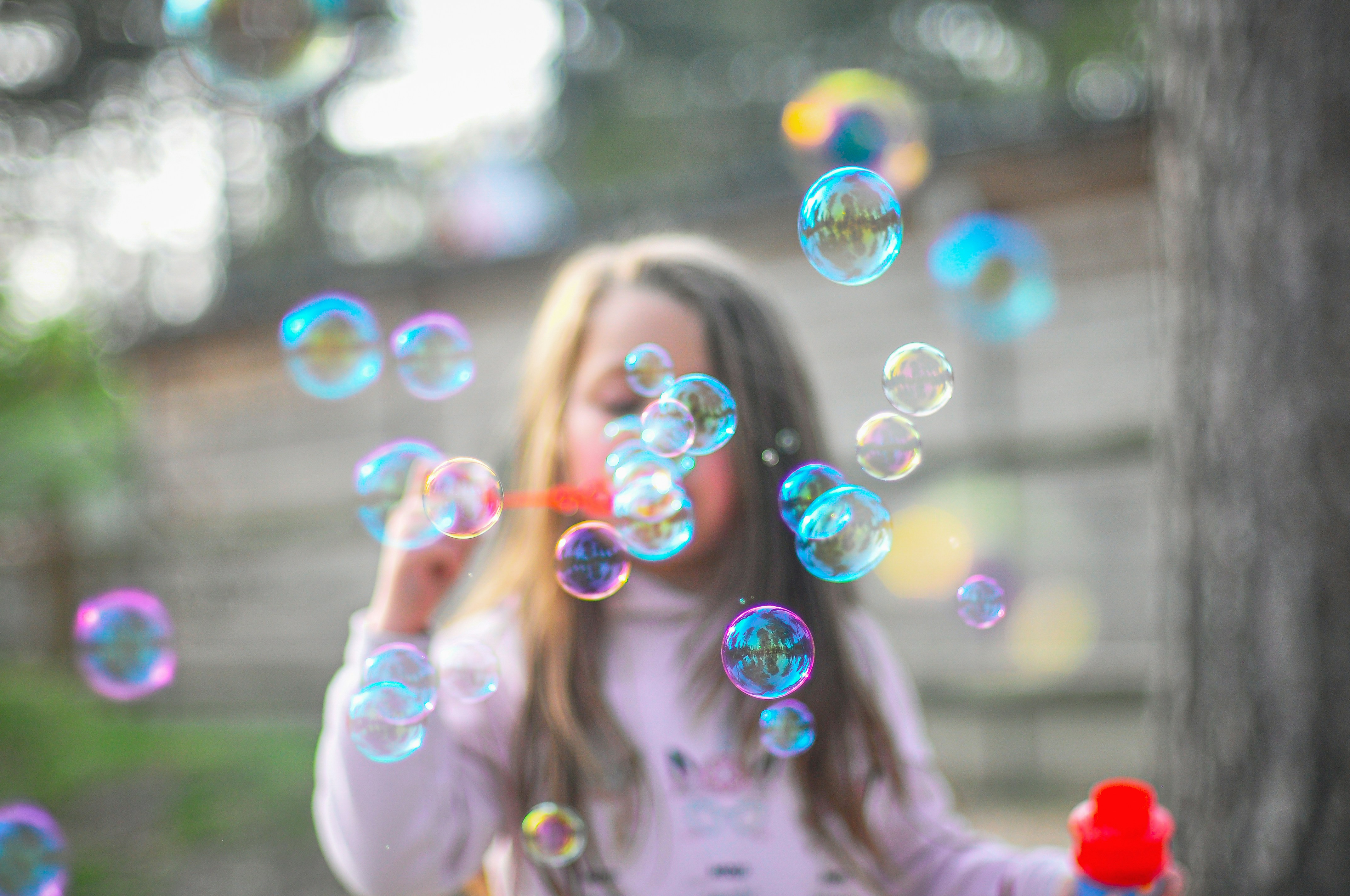 A child blowing bubbles