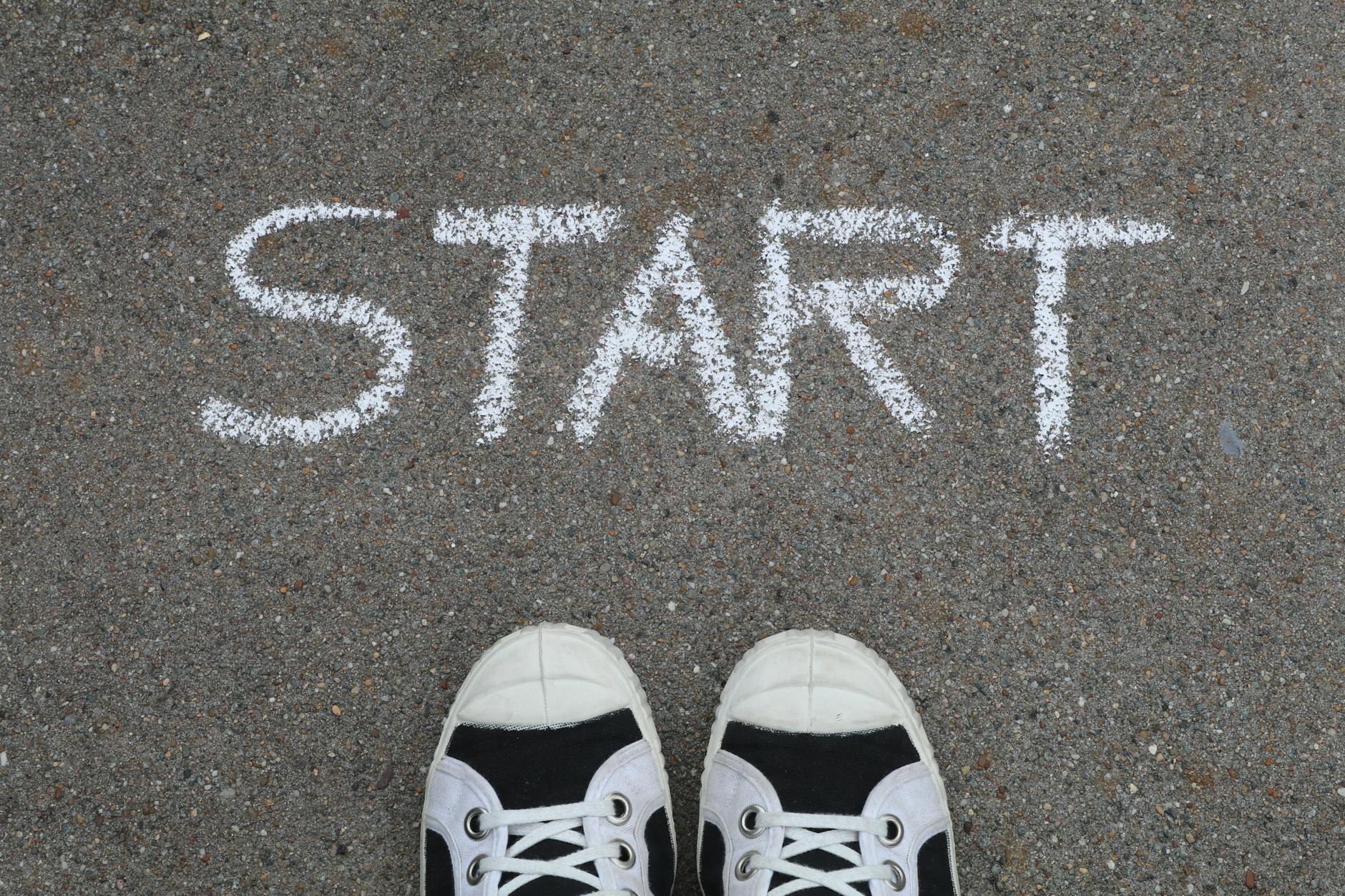 start written on asphalt